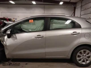 2013 Kia Rio LX with VIN KNADM5A31D6274318, listed as a IAAI auction lot 40986091 with 182,000 mi miles. Bid and sale history available at carsss.com. Image 14.