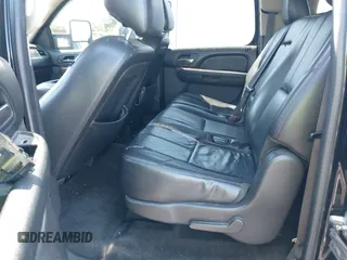 2014 Chevrolet Suburban LT z VIN 1GNSCJE02ER116017, wystawiony jako IAAI lot #42308074 z przebiegiem 228 365 mil mil oraz . Historia ofert i sprzedaży dostępna na DreamBid. Obrazek 8.
