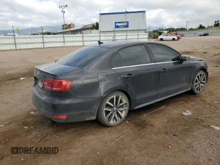 2014 Volkswagen Jetta GLI Edition 30 with VIN 3VW4S7AJ6EM211054, listed as a Copart auction lot 62810235 with 151,382 mi miles and Salvage title. Bid and sale history available at DreamBid. Image 3.