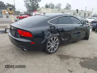 2013 Audi A7 Premium Plus with VIN WAUYGAFC7DN101757, listed as a IAAI auction lot 42485884 with 135,330 mi miles and . Bid and sale history available at DreamBid. Image 4.