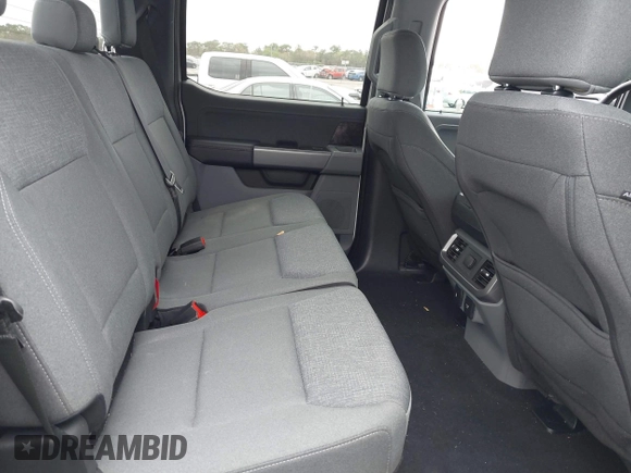 2024 Ford F-150 Lightning XLT with VIN 1FTVW3LKXRWG01185, listed as a IAAI auction lot 41679606 with 4,961 mi miles and . Bid and sale history available at DreamBid. Image 8.