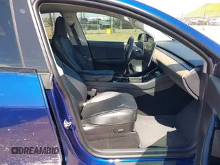 2020 Tesla Model Y Long Range with VIN 5YJYGDEF4LF000494, listed as a IAAI auction lot 41894856 with 118,638 mi miles and . Bid and sale history available at DreamBid. Image 5.