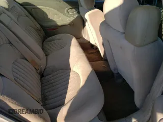 2003 Pontiac Bonneville SE z VIN 1G2HX52K834126392, wystawiony jako Copart lot #43009704 z przebiegiem 231 223 mil mil oraz Szkoda całkowita • Salvage title. Historia ofert i sprzedaży dostępna na DreamBid. Obrazek 11.