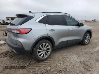 2021 Ford Escape Titanium с VIN 1FMCU9J99MUB12020, выставлен на аукционе Copart как лот 51443365 с пробегом 63 504 миль миль и Списание • Salvage title. История ставок и продаж доступна на DreamBid. Изображение 3.