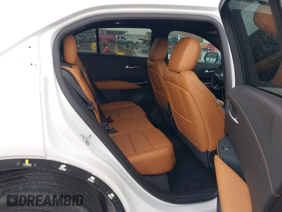 2024 Cadillac XT4 FWD Sport with VIN 1GYFZER42RF246488, listed as a IAAI auction lot 42029551 with 6,476 mi miles and . Bid and sale history available at DreamBid. Image 8.