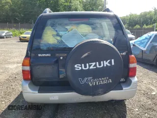 1999 Suzuki Grand Vitara z VIN JS3TD62VXX4100236, wystawiony jako Copart lot #57228075 z przebiegiem Nie podano mil oraz Szkody całkowita. Historia ofert i sprzedaży dostępna na DreamBid. Obrazek 6.