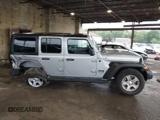 2022 Jeep Wrangler Unlimited Sport S with VIN 1C4HJXDG6NW144396, listed as a IAAI auction lot 42362283 with 19,854 mi miles and . Bid and sale history available at DreamBid. Image 14.