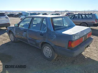 1985 Honda Civic z VIN JHMAK5433FS009299, wystawiony jako IAAI lot #41576709 z przebiegiem 152 094 mil mil oraz . Historia ofert i sprzedaży dostępna na DreamBid. Obrazek 3.