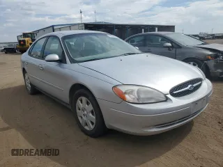 2000 Ford Taurus SE with VIN 1FAFP53U6YG111341, listed as a Copart auction lot 70696814 with 98,033 mi miles and Clean Title. Bid and sale history available at DreamBid. Image 4.