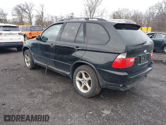2001 BMW X5 3.0i with VIN WBAFA53501LM71185, listed as a IAAI auction lot 41610473 with 141,322 mi miles. Bid and sale history available at carsss.com. Image 3.