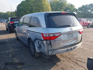 2013 Honda Odyssey EX-L with VIN 5FNRL5H6XDB084016, listed as a IAAI auction lot 42044300 with 156,296 mi miles and . Bid and sale history available at carsss.com. Image 3.