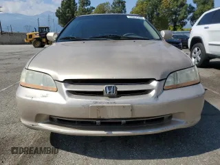 2000 Honda Accord LX z VIN 1HGCG1643YA089899, wystawiony jako Copart lot #54937555 z przebiegiem 196 596 mil mil oraz Szkoda całkowita • Salvage title. Historia ofert i sprzedaży dostępna na DreamBid. Obrazek 5.
