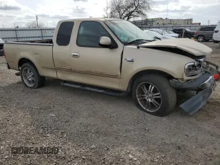 1999 Ford F-150 with VIN 1FTRX17W3XKA48013, listed as a Copart auction lot 45735765 with Not Provided miles and Salvage Title. Bid and sale history available at DreamBid. Image 4.