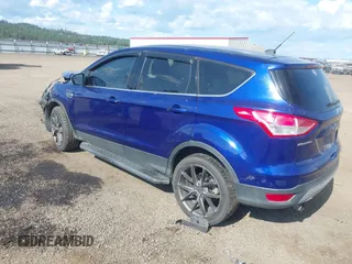 2013 Ford Escape SE with VIN 1FMCU9GXXDUB70983, listed as a IAAI auction lot 42432050 with 97,515 mi miles and . Bid and sale history available at DreamBid. Image 3.