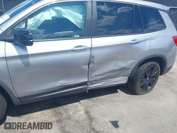 2021 Honda Passport Sport with VIN 5FNYF7H27MB003467, listed as a IAAI auction lot 42183219 with 52,156 mi miles and . Bid and sale history available at DreamBid. Image 6.