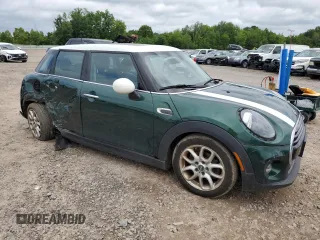 2019 MINI Hardtop 4 Door Cooper with VIN WMWXU1C51K2F82567, listed as a Copart auction lot 63321725 with 96,770 mi miles and Salvage title. Bid and sale history available at DreamBid. Image 4.
