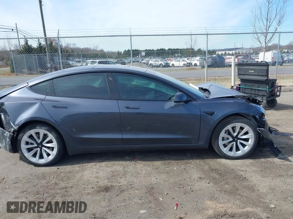 2022 Tesla Model 3 Long Range with VIN 5YJ3E1EB0NF314870, listed as a IAAI auction lot 41762301 with 38,840 mi miles and . Bid and sale history available at DreamBid. Image 13.