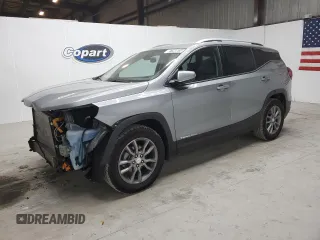 2024 GMC Terrain SLT z VIN 3GKALPEG7RL180866, wystawiony jako Copart lot #87280534 z przebiegiem 21 233 mil mil oraz Czysty tytuł • Clean title. Historia ofert i sprzedaży dostępna na DreamBid. Obrazek 1.