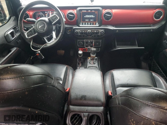 2021 Jeep Wrangler Unlimited Rubicon with VIN 1C4HJXFNXMW612186, listed as a Copart auction lot 56786665 with 52,379 mi miles and Salvage title. Bid and sale history available at DreamBid. Image 8.
