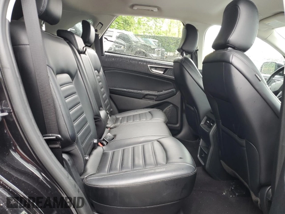 2024 Ford Edge SEL z VIN 2FMPK4J99RBB00666, wystawiony jako Copart lot #58194325 z przebiegiem 28 661 mil mil oraz Czysty tytuł • Clean title. Historia ofert i sprzedaży dostępna na DreamBid. Obrazek 11.