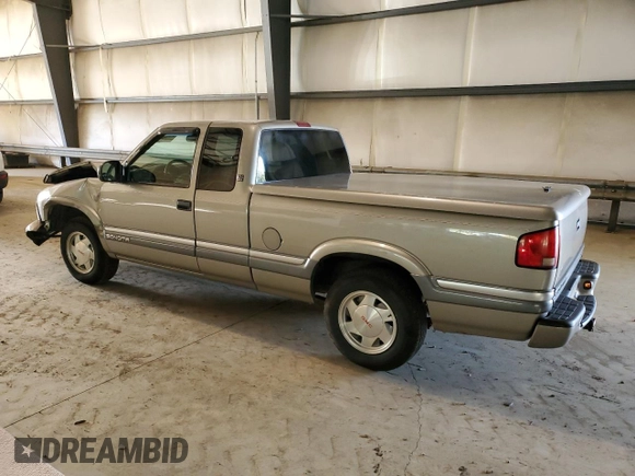 2000 GMC Sonoma SLS z VIN 1GTCS19W0Y8146125, wystawiony jako Copart lot #71576724 z przebiegiem 73 854 mil mil oraz Szkody całkowita. Historia ofert i sprzedaży dostępna na DreamBid. Obrazek 2.