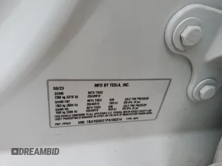 2023 Tesla Model Y Long Range with VIN 7SAYGDEE1PA160314, listed as a Copart auction lot 45048845 with 29,370 mi miles and Salvage Title. Bid and sale history available at DreamBid. Image 14.
