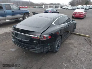 2018 Tesla Model S 75D with VIN 5YJSA1E20JF275490, listed as a IAAI auction lot 41855185 with 253,031 mi miles. Bid and sale history available at carsss.com. Image 4.