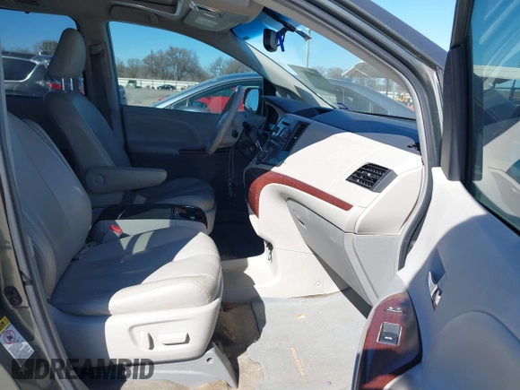 2013 Toyota Sienna XLE AAS with VIN 5TDYK3DCXDS379272, listed as a IAAI auction lot 41407282 with 240,491 mi miles and . Bid and sale history available at carsss.com. Image 5.