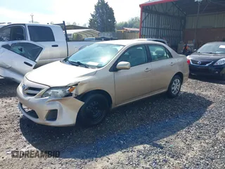 2011 Toyota Corolla L with VIN 2T1BU4EE1BC547635, listed as a IAAI auction lot 42053236 with 121,485 mi miles. Bid and sale history available at carsss.com. Image 17.