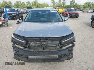 2023 Honda Civic Touring z VIN 2HGFE1F92PH323562, wystawiony jako Copart lot #54060205 z przebiegiem 20 504 mil mil oraz Czysty tytuł • Clean title. Historia ofert i sprzedaży dostępna na DreamBid. Obrazek 5.