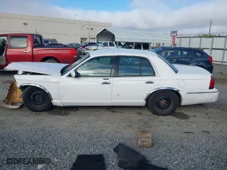 1999 Mercury Grand Marquis GS with VIN 2MEFM74W6XX604927, listed as a IAAI auction lot 41467177 with 187,277 mi miles. Bid and sale history available at carsss.com. Image 14.