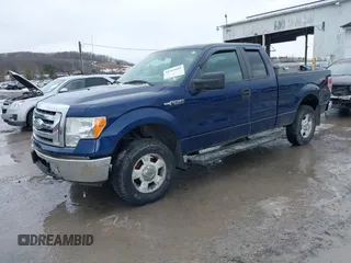 2009 Ford F-150 STX with VIN 1FTRX14809KC93165, listed as a IAAI auction lot 41563841 with 156,690 mi miles. Bid and sale history available at carsss.com. Image 2.