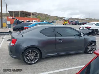 2013 Scion tC with VIN JTKJF5C74D3052964, listed as a IAAI auction lot 41804627 with 244,013 mi miles. Bid and sale history available at carsss.com. Image 13.