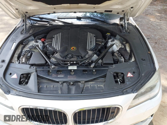 2013 BMW 7 Series 750Li with VIN WBAYE8C55DDS16013, listed as a IAAI auction lot 42709519 with 123,405 mi miles and . Bid and sale history available at DreamBid. Image 10.