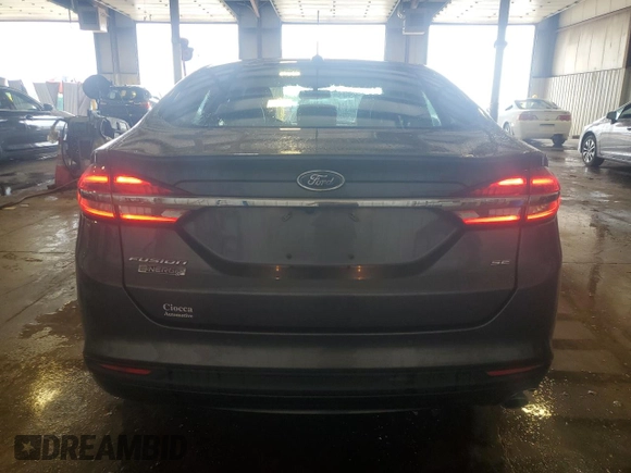 2018 Ford Fusion SE with VIN 3FA6P0PUXJR123360, listed as a Copart auction lot 65339715 with 113,635 mi miles and Salvage title. Bid and sale history available at DreamBid. Image 6.