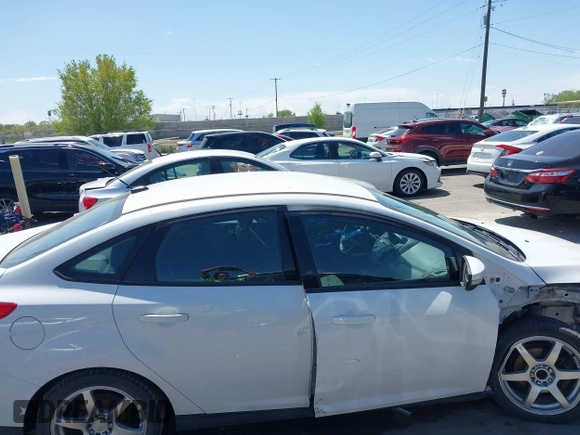2017 Ford Focus SE with VIN 1FADP3F24HL232527, listed as a IAAI auction lot 42110702 with 95,327 mi miles and . Bid and sale history available at DreamBid. Image 14.