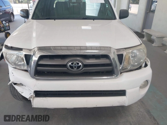2009 Toyota Tacoma PreRunner with VIN 3TMJU62N49M090994, listed as a IAAI auction lot 41787065 with 207,386 mi miles. Bid and sale history available at carsss.com. Image 12.