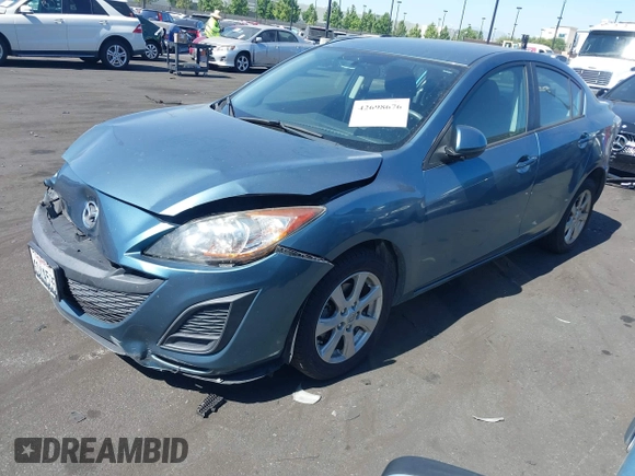 2011 Mazda 3 i Touring with VIN JM1BL1VG0B1498676, listed as a IAAI auction lot 42698676 with 111,719 mi miles and . Bid and sale history available at DreamBid. Image 2.
