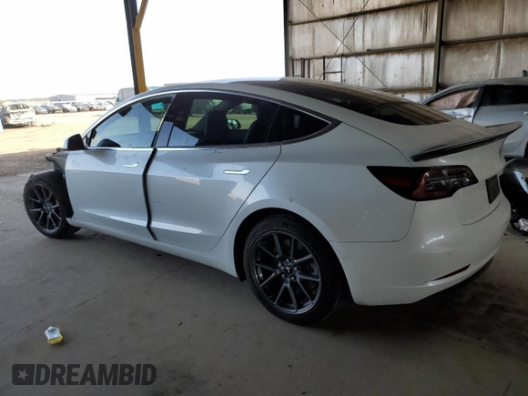 2020 Tesla Model 3 Standard Range Plus with VIN 5YJ3E1EA6LF645215, listed as a Copart auction lot 47882375 with 69,317 mi miles and Salvage Title. Bid and sale history available at DreamBid. Image 2.