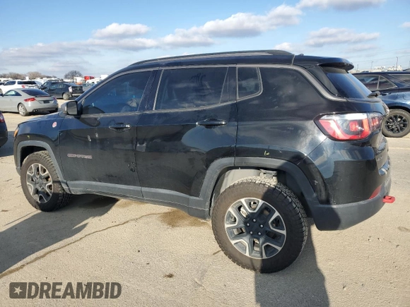 2020 Jeep Compass Trailhawk with VIN 3C4NJDDBXLT196297, listed as a Copart auction lot 87486584 with 108,766 mi miles and Salvage Title. Bid and sale history available at carsss.com. Image 2.
