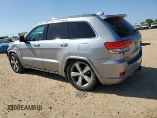 2014 Jeep Grand Cherokee Overland with VIN 1C4RJFCG7EC153156, listed as a Copart auction lot 52452925 with 152,348 mi miles and Salvage Title. Bid and sale history available at DreamBid. Image 2.