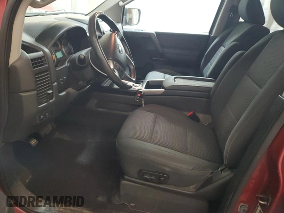 2014 Nissan Titan Pro-4X z VIN 1N6AA0EC6EN501437, wystawiony jako Copart lot #82822234 z przebiegiem 131 112 mil mil oraz Szkoda całkowita • Salvage title. Historia ofert i sprzedaży dostępna na DreamBid. Obrazek 7.