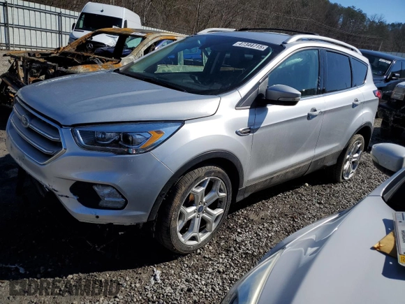 2019 Ford Escape Titanium with VIN 1FMCU9J98KUB53669, listed as a Copart auction lot 47344715 with 84,051 mi miles and Salvage title. Bid and sale history available at DreamBid. Image 1.