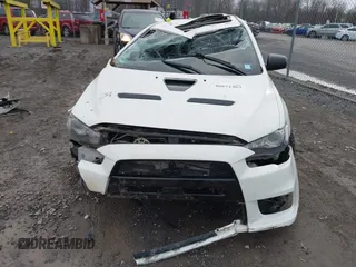 2014 Mitsubishi Lancer Evolution GSR with VIN JA32W8FV5EU012572, listed as a IAAI auction lot 40871463 with 89,529 mi miles. Bid and sale history available at carsss.com. Image 13.