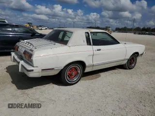 1977 Ford Mustang z VIN 7F04Z150204, wystawiony jako Copart lot #77276344 z przebiegiem 94 802 mil mil oraz Szkoda całkowita • Salvage title. Historia ofert i sprzedaży dostępna na DreamBid. Obrazek 3.