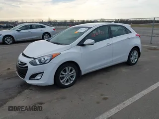 2013 Hyundai Elantra GT with VIN KMHD35LE1DU145894, listed as a IAAI auction lot 41828751 with 90,529 mi miles. Bid and sale history available at carsss.com. Image 2.