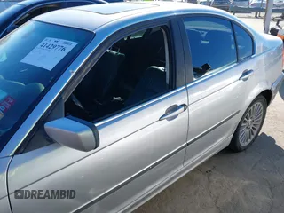 2003 BMW 3 Series 330xi with VIN WBAEW53493PN30296, listed as a IAAI auction lot 41429776 with 233,013 mi miles. Bid and sale history available at carsss.com. Image 14.
