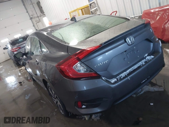 2018 Honda Civic EX-T with VIN JHMFC1F35JX031132, listed as a IAAI auction lot 41591028 with 111,087 mi miles and . Bid and sale history available at DreamBid. Image 3.