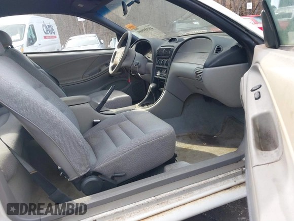 1997 Ford Mustang with VIN 1FALP4040VF200826, listed as a IAAI auction lot 41555969 with 82,134 mi miles. Bid and sale history available at carsss.com. Image 5.