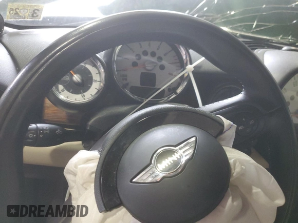 2011 MINI Convertible с VIN WMWZN3C5XBTZ89537, выставлен на аукционе Copart как лот 44161315 с пробегом Не указан миль и Чистый • Clean title. История ставок и продаж доступна на DreamBid. Изображение 9.